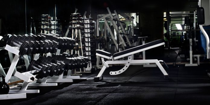 Many,Black,Dumbbells,In,Dark,Weight,Room,,Horizontal,Photo